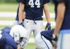 Springdale Har-Ber’s Hunter Kissinger prepares to run a drill during a May 19 practice in Springdale.