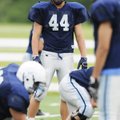 Springdale Har-Ber’s Hunter Kissinger prepares to run a drill during a May 19 practice in Springdale...