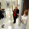 Brenda Zedlitz, director of EOA Head Start, from right, talks Wednesday with Misti McCoy, director o...