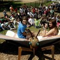 Maddie Mills (left), 17, (left) and Hannah Ray, 16, sit on the Butterfly Bench on Thursday before it...