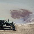 A bulldozer works near an oil spill in Grand Isle, La. on Thursday.