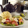  The chicken salad fruit plate, with poppy seed dressing and an orange roll, is a favorite at The Cr...