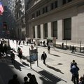 In this file photo taken March 9, 2010, people walk on Wall Street, in New York. Stocks appear set t...
