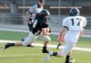  Bentonville’s Drew Edwards, left, attempts to turn the corner against Corbin Copeland during the Tigers’ Black and White game Friday in Tiger Stadium.
