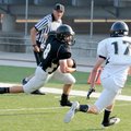  Bentonville’s Drew Edwards, left, attempts to turn the corner against Corbin Copeland during the Ti...