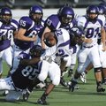  Fayetteville senior Devin Bowers, left, tackles junior Austin Bramwell near the line of scrimmage d...