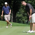 Drew Stewart, right, putts on No. 6 as Dusty Gourley watches Saturday during the Ellis Bogan Memoria...