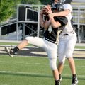 Dakota Baggett, front, intercepts a pass intended for Austin Molitor in Friday’s scrimmage in Tiger ...