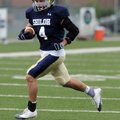 Shiloh Christian’s Garrett Harper carries the ball upfield during Tuesday’s practice in Champions St...