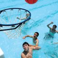  Jeremy Howard, 13, waits for the rebound Saturday during a basketball game at Prairie Grove Aquatic...
