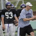 New Fayetteville assistant coach Jeb Huckeba, right, illustrates a certain technique to some of the ...