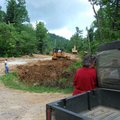 Nancy Seal (foreground) talks to neighbors John and Johnie Bart about work being done on Blackjack L...