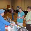 Gravette author Radine Trees Nehring visits with Sandy Kernej of Bentonville and Sandy Pianalto of R...