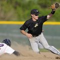 Bentonville’s Logan Pearson dives for the throw from catcher Blake Baxendale while attempting to pic...