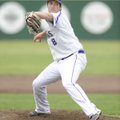 Fayetteville starter Brandon Allen delivers a pitch during the third inning of the Bulldogs’ 11-7 wi...