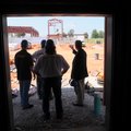 Pig Trail Harley-Davidson staff members Kyle Johnson, from left, Buck Blanchard and Mark Shaffer tak...