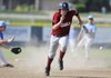 Springdale High’s Gatlin Watson runs to third base during Wednesday’s game against Springdale Har-Ber Wednesday in the Ozark Wood/ Metal League. 