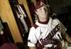Arkansas catcher Tom Hauskey sits inside the clubhouse at Baum Stadium.