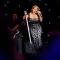 Mariah Carey performs on stage Friday, June 4, 2010, during the annual Walmart Shareholders meeting ...