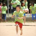 HOT FEET - Joe Tam, 11, a fifth-grader at Butterfield Trail Elementary School in Fayetteville, yells...