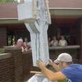 CROSS FOR ST. ANDREWS - Parishioners at St. Andrew’s Episcopal Church in Rogers watch Cliff Gibson o...