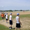 Members of the Physicians’ Specialty Hospital Wildcats baseball team practice on the field Thursday ...