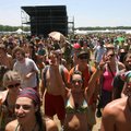 Festival fans enjoy the music Thursday of the Eureka Springs band Mountain Sprout during the Wakarus...