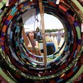 Jacquelyn Schneider of Milwaukee looks Thursday at hoops for sale in the tent of Infinite Divine of...