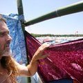 Danny Zinck of Little Rock looks out over the campground of the Wakarusa music festival Thursday fro...