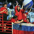 Wal-Mart Stores Inc. associates from Russia await the beginning of the company's shareholders meetin...