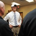 SNOW-BOUND - Bentonville’s Tyler Trudo, center, talks with his father, Dave Trudo, right, and Tigers...