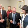 County Judge Dave Bisbee, center, leaves a Benton County court with his wife, Linda Bisbee, right, a...