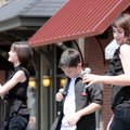 FIRST FRIDAY - Gabby Chronister, 14, from left, E.J. Chronister, 11, and Alex Andrews, 14, sing Rasc...