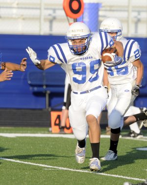 Rogers High junior Diego Rojas sprints upfield during a scrimmage Friday in Mountie Stadium in Rogers. To see and read more about this event got to photos.nwaonline.com.