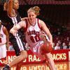 Gentry adds former Razorback to staff