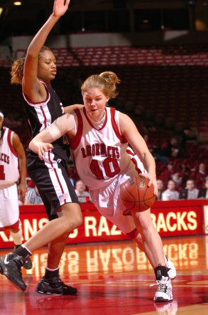 Arkansas’ Sarah Pfeifer drives the basket against Mississippi State on Jan. 27, 2008, in Bud Walton Arena in Fayetteville.