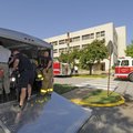Fayetteville firefighters prepare to investigate a chemical spill Friday at the University of Arkans...