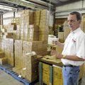 Skip Carnes, co-owner of Arkie Lures, talks about their distribution facility Wednesday at their fac...