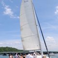 SLOOP RIDE - People gather at the Prairie Creek launching dock Saturday for a ride on Beaver Lake ab...