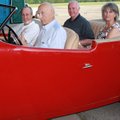 Jim Younkin, second from left, takes Fayetteville Mayor Lioneld Jordan, from left, and Bob and Trici...