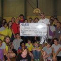 DONATION  - Delona Williams and Brandon Craft, physical education teachers at Holt Middle School on ...