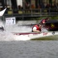 Arkansas’ Chris Poague drives his team’s solar powered boat to first place in the 200 meter sprint c...