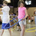 Leah Etchison, 10, hula hoops during a field day celebration of the last day of school Monday at Geo...