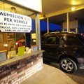 James Culberson sells tickets at the gate of the 112 Drive-In in Fayetteville.