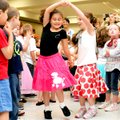 STROLLIN’, ROCKIN’ & ROLLIN’ - Kindergartners Cassie Whitaker, left, and Taylor Wilmot dance Friday ...