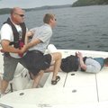 Sgt. Lynn Morgan with the Washington County Sheriff’s Office takes mock-robbery suspects Rusty Johns...