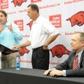 Rich Morris (from left) and ESPN sportscaster Jimmy Dykes, both University of Arkansas graduates, an...