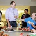 Leah Jones, right, jokes with Tyler Clark, youth programs coordinator at The Jones Center, on Thursd...