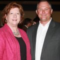Big Brothers Big Sisters of Northwest Arkansas board member Jeff Wisdom visits with Karen Parker of ...