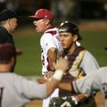 Arkansas Coach Dave Van Horn argues an inning-ending call with the home plate umpire after the seven...